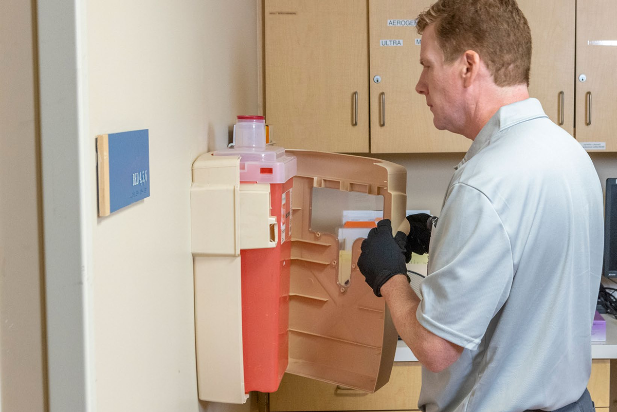 sharps disposal container